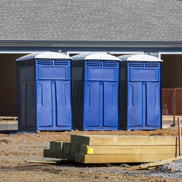 what is the cost difference between standard and deluxe portable toilet rentals in Funston GA